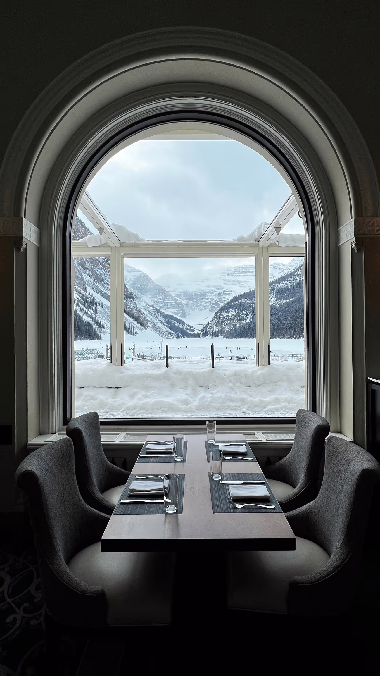 A mountain village held in deep snow beneath high alpine peaks